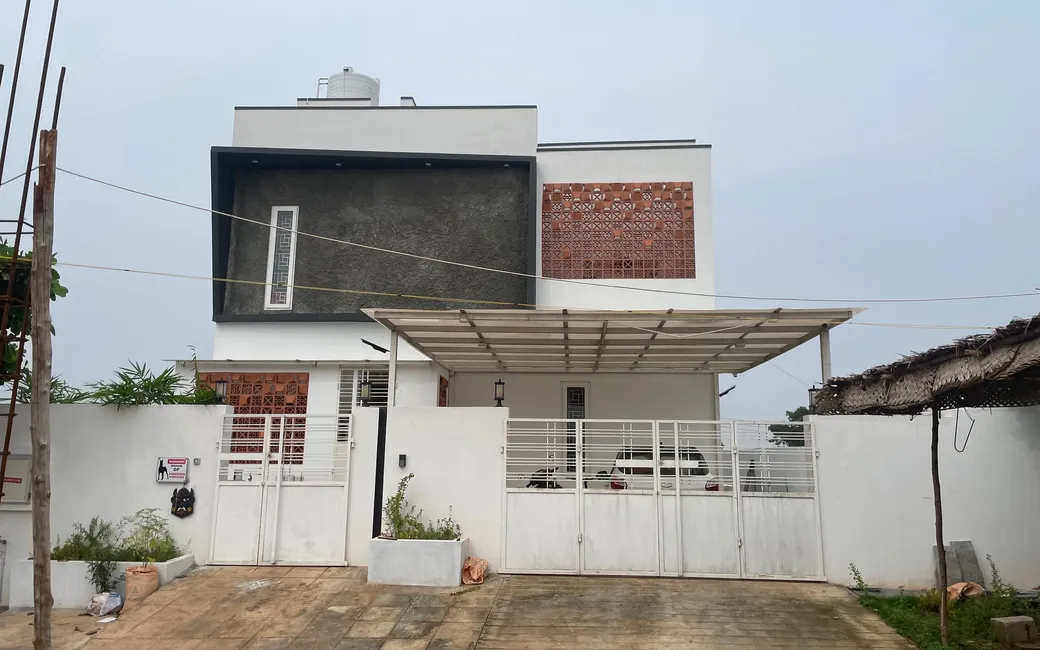 Completed Poriyaalan home — the finished street elevation