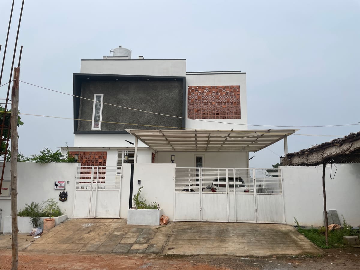 Ten Square House, Ishwarya Nagar, Theni — a completed Poriyaalan home